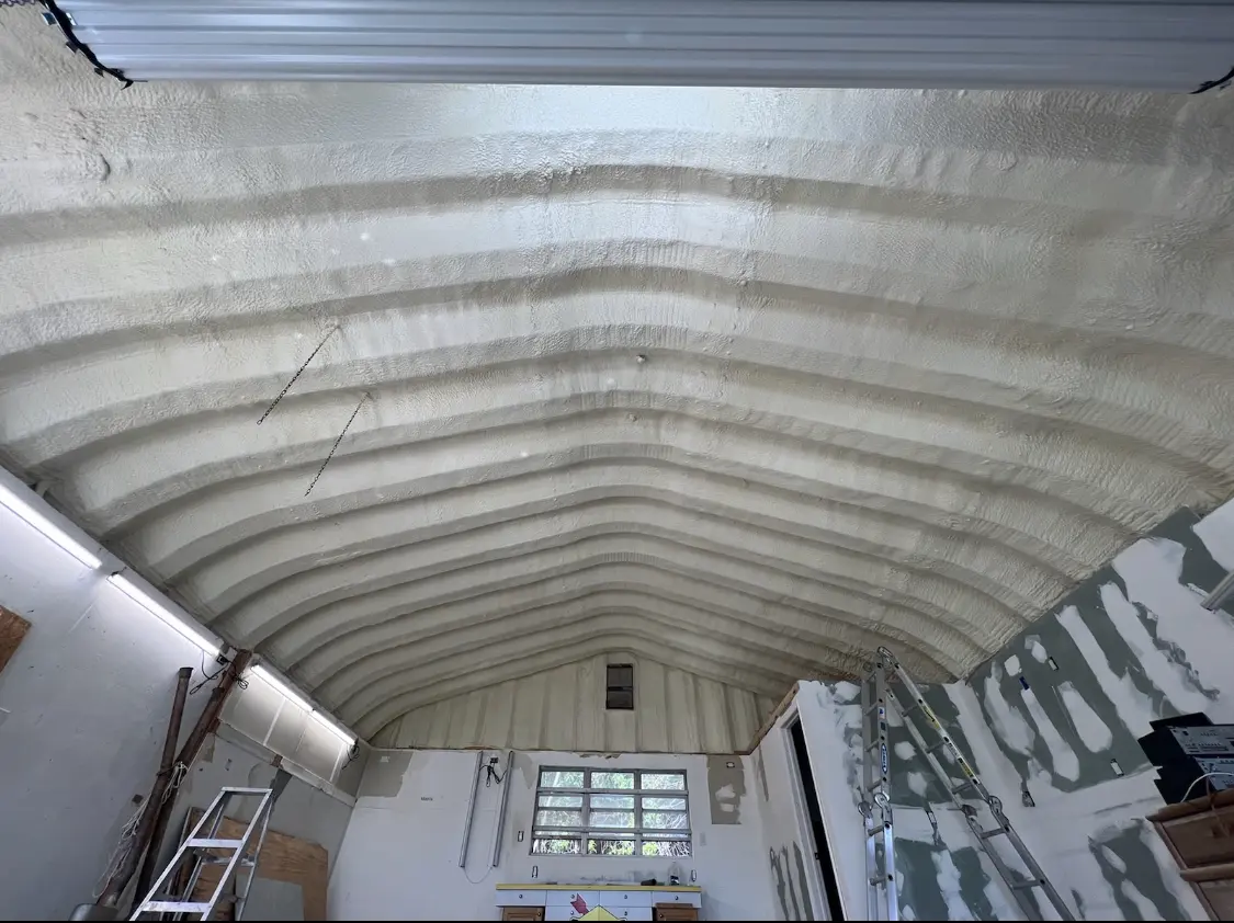 Spray polyurethane foam applied to the underside of a metal roof deck in Boulder Creek
